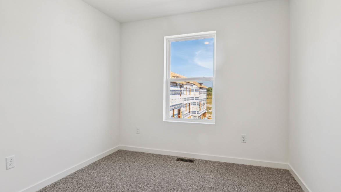 6510 Linden Trail, Unit E Wonder Lake, IL 60097 - Photo 13 of 42 an empty room with windows