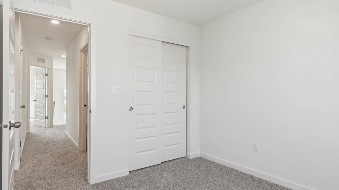 6510 Linden Trail, Unit E Wonder Lake, IL 60097 - Photo 15 of 42 an empty room with a hallway