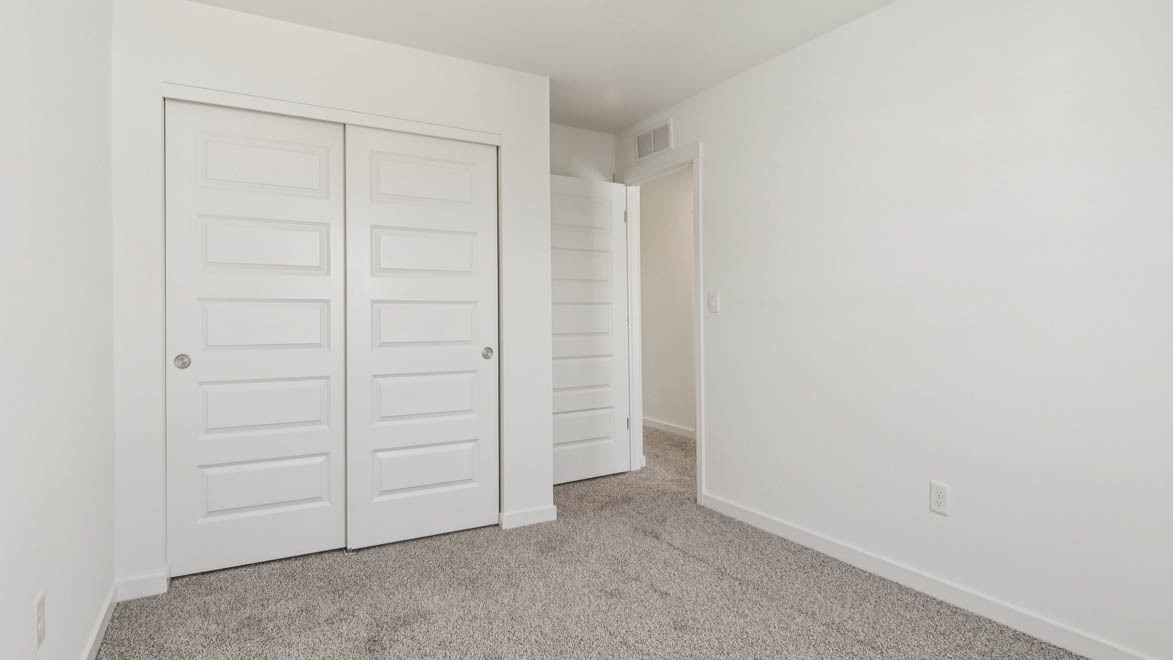 6510 Linden Trail, Unit E Wonder Lake, IL 60097 - Photo 18 of 42 an empty room with closet