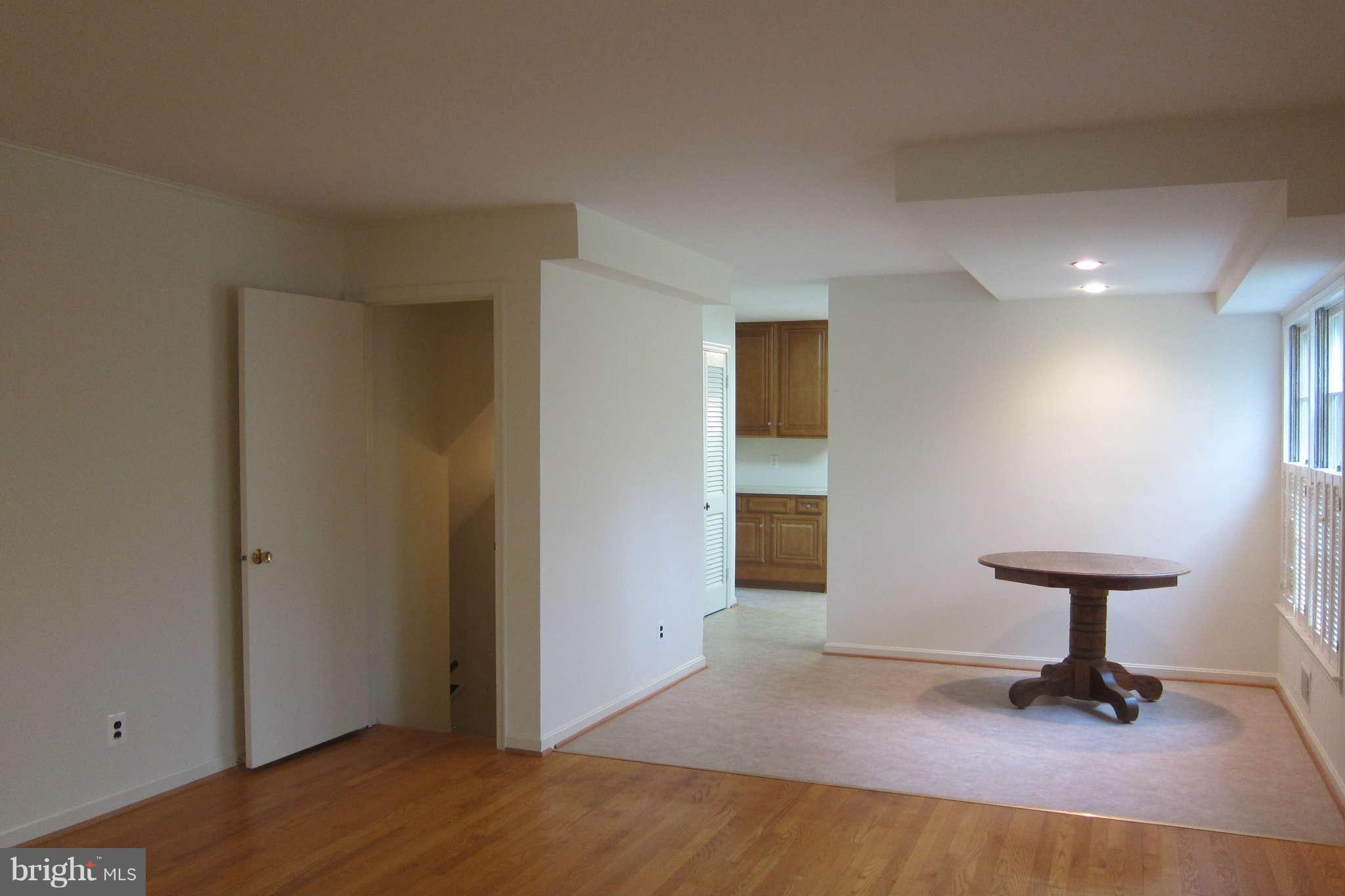 8642 Gateshead Road Alexandria, VA 22309 - Photo 14 of 20 Family Room, standing at fpl looking toward kit.