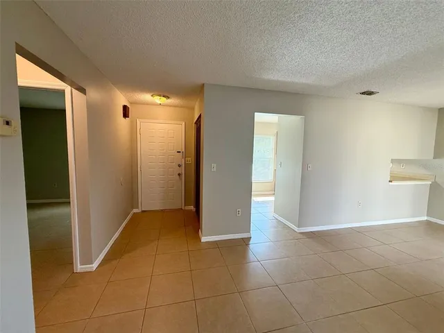 a view of entryway with bathroom