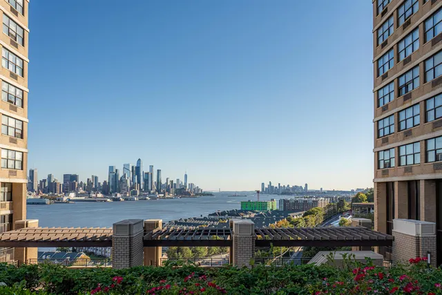 a view of roof deck with patio