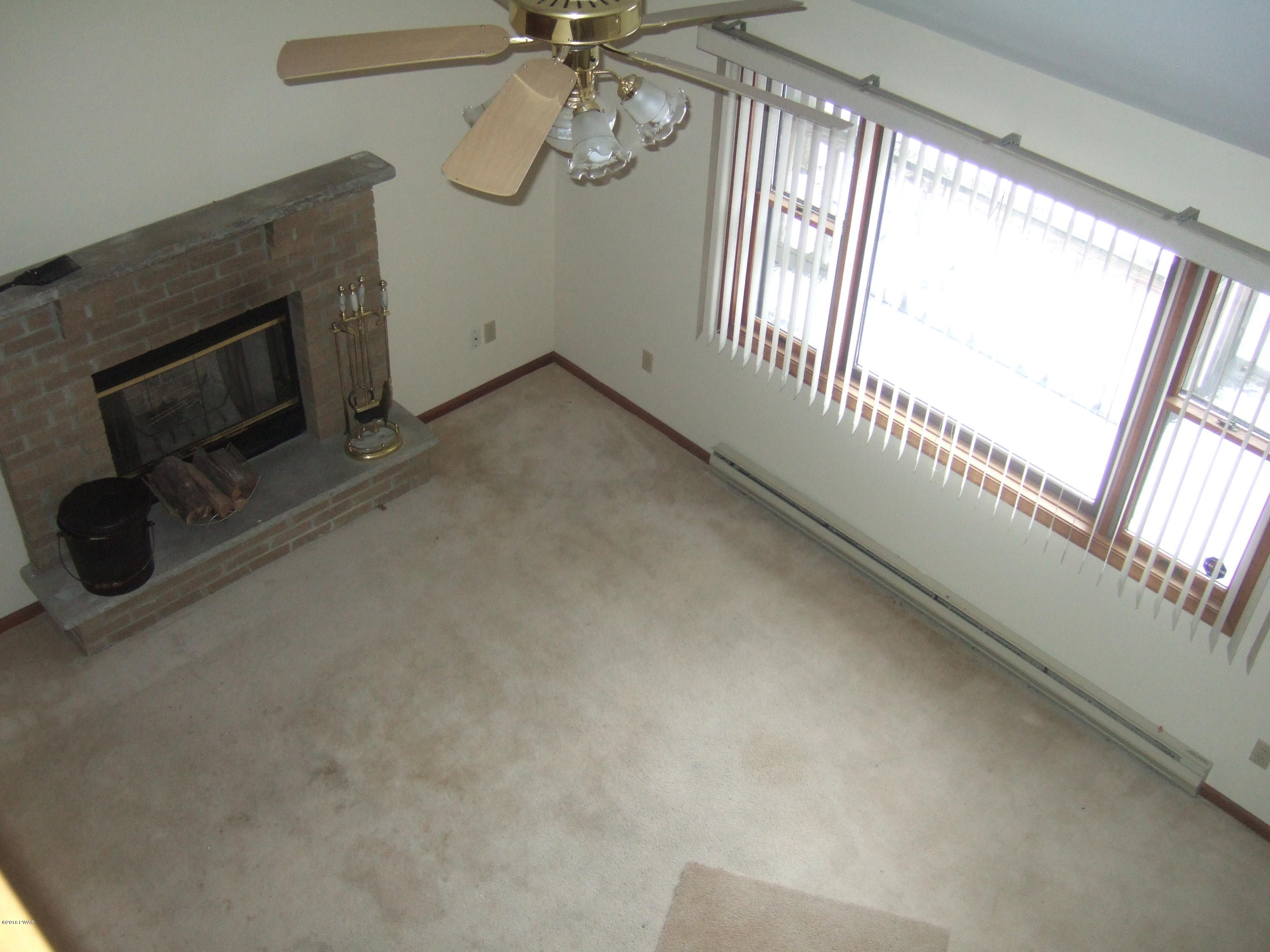 2654 Boulder Road Lake Ariel, PA 18436 - Photo 8 of 40 a view of a livingroom with a fireplace