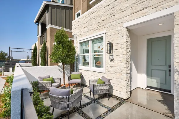 swimming pool with outdoor seating and yard