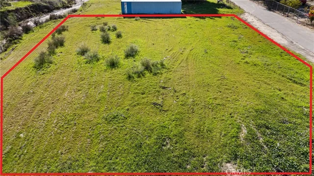 a view of swimming pool with a yard and sitting area