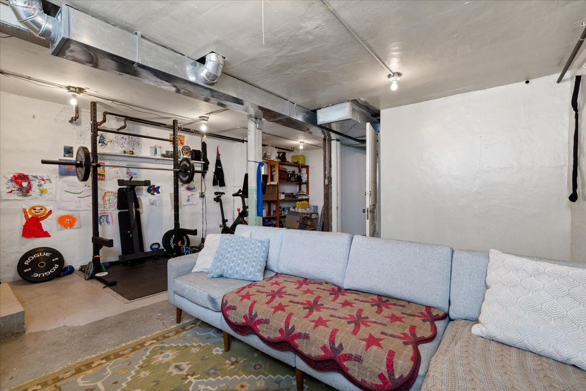 2735 North Ridgeway Avenue Chicago, IL 60647 - Photo 32 of 40 a bedroom with furniture and a couch