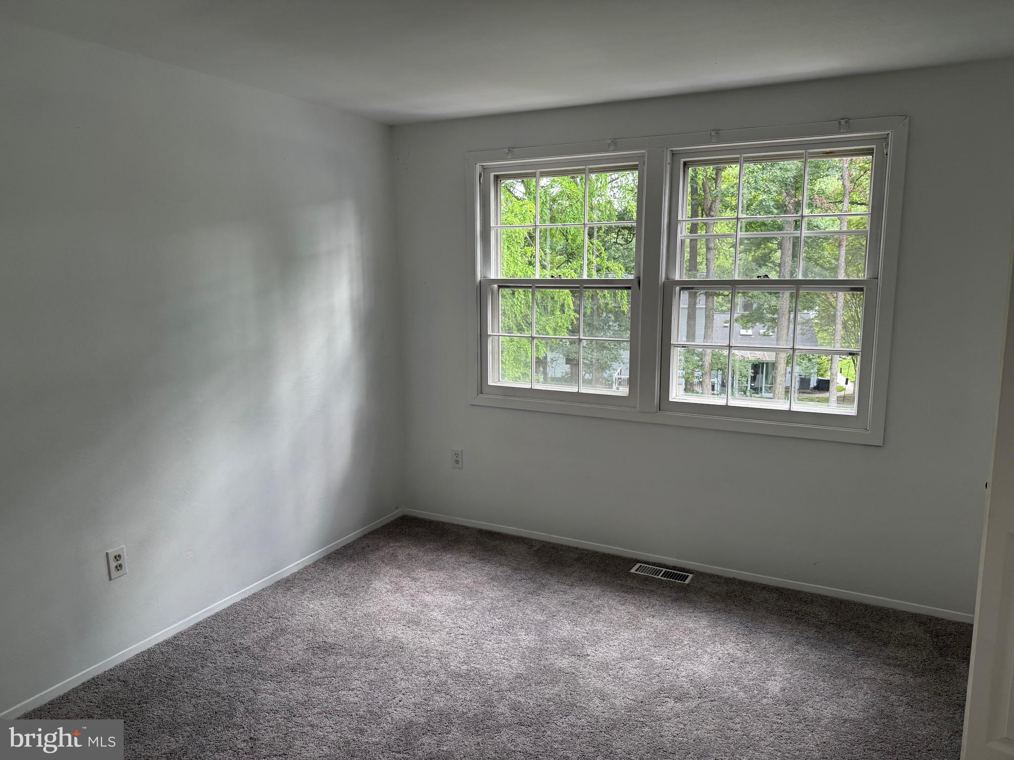 12241 Shadetree Lane Laurel, MD 20708 - Photo 12 of 25 an empty room with a window