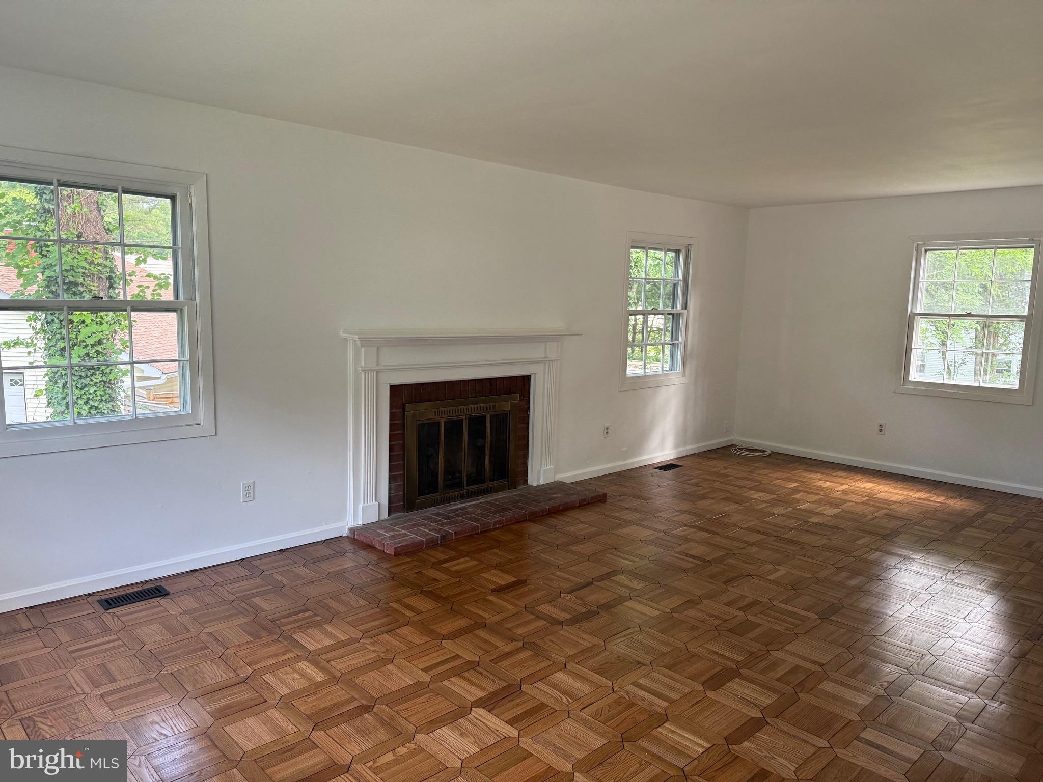 12241 Shadetree Lane Laurel, MD 20708 - Photo 14 of 25 an empty room with windows
