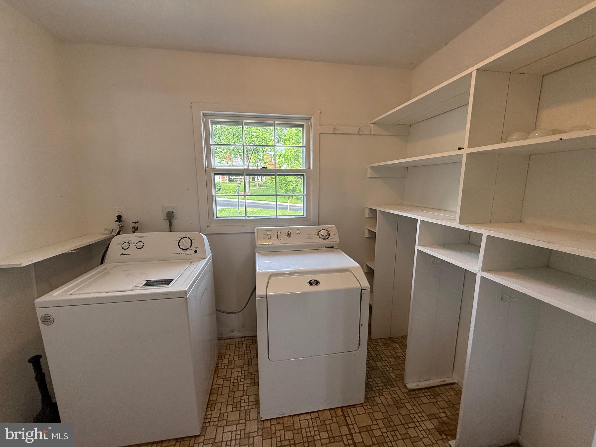 12241 Shadetree Lane Laurel, MD 20708 - Photo 18 of 25 a utility room with dryer and washer