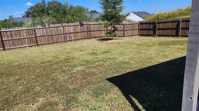 a view of outdoor space and yard