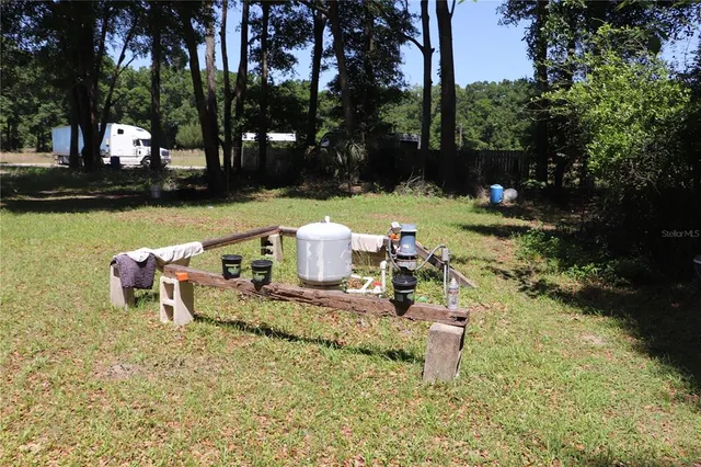 a view of a table and chairs in patio