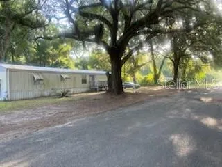 a view of outdoor space and yard
