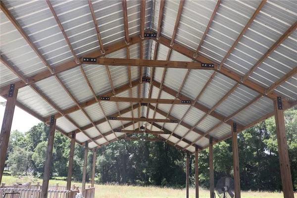 a view of staircase with a carpet