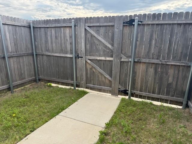 464 Reverie Way Ferris, TX 75125 - Photo 20 of 21 a backyard of the house with a wooden fence