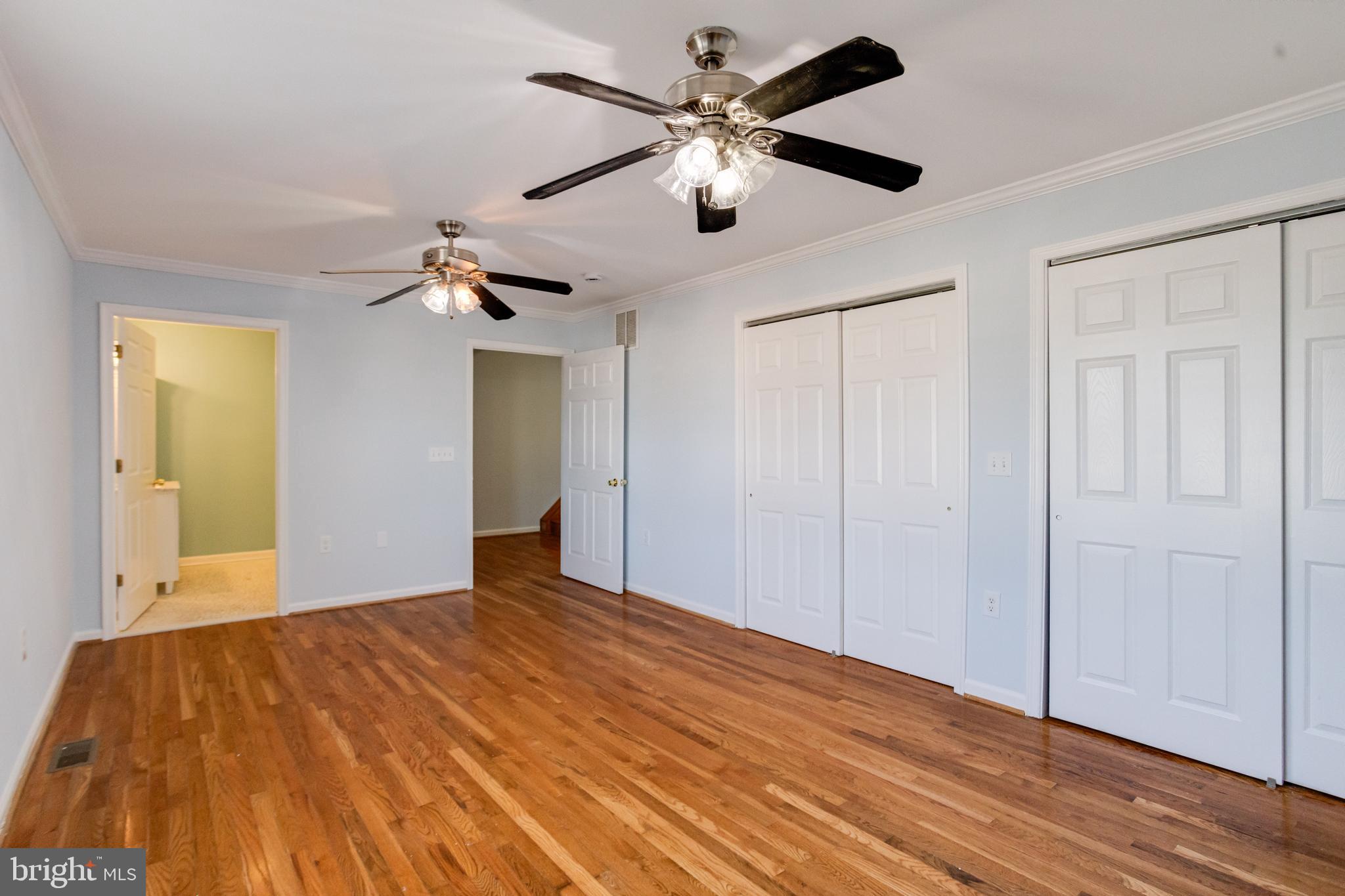 7815 Fairgreen Road Baltimore, MD 21222 - Photo 15 of 54 Main Level Primary Bedroom with Attached Bath