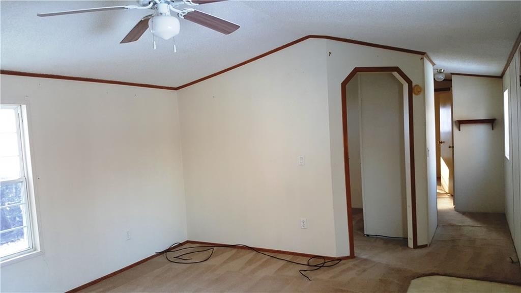 1403 Robb Road Ligonier, PA 15658 - Photo 12 of 18 This smaller room, 9'x7', with arched doorway would work well for an office area.