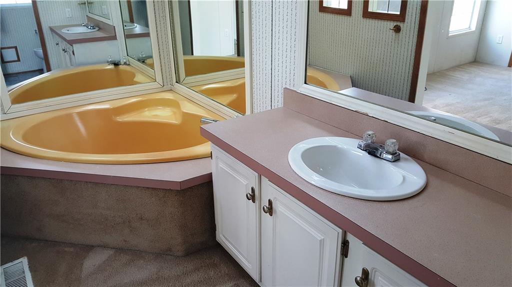 1403 Robb Road Ligonier, PA 15658 - Photo 14 of 18 Master bath with tub, sink & toilet & shower stall