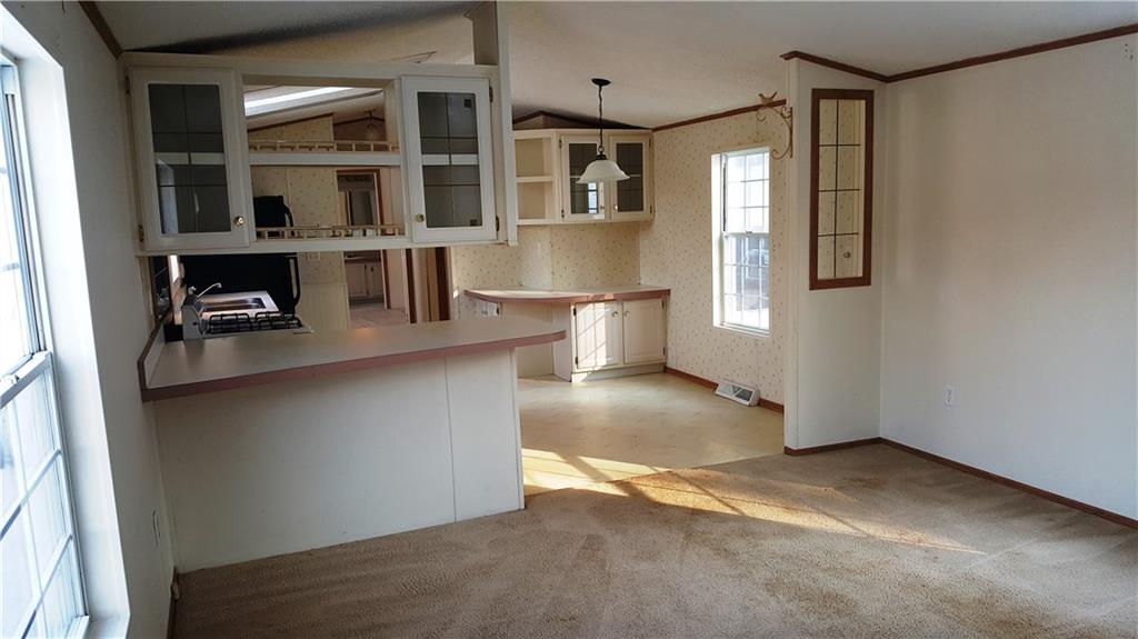 1403 Robb Road Ligonier, PA 15658 - Photo 8 of 18 Open area of the kitchen into the living room.