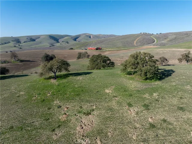 a view of a yard with an ocean view
