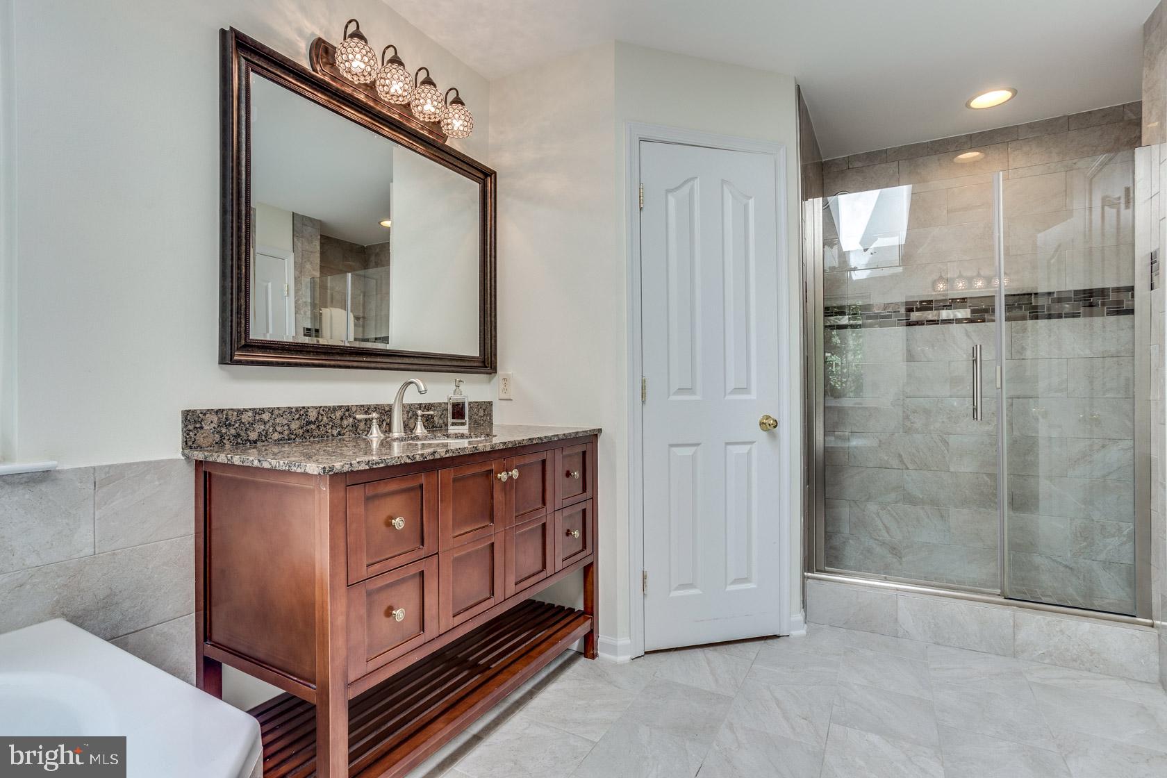 12408 Spring Ridge Court Laurel, MD 20708 - Photo 7 of 29 NICE SEPARATE TOILET SPACE & SPACIOUS TILED SHOWER
