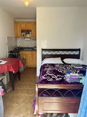 a kitchen with a stove and a microwave