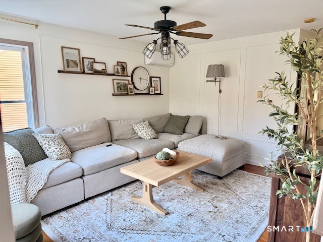104 Ginger Lane Torrington, CT 06790 - Photo 2 of 33 a living room with furniture and a rug