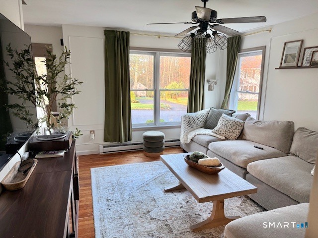 104 Ginger Lane Torrington, CT 06790 - Photo 3 of 33 a living room with furniture and a large window