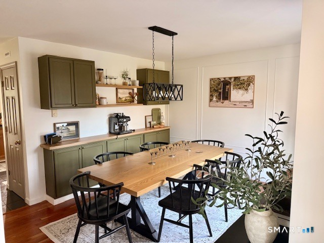 104 Ginger Lane Torrington, CT 06790 - Photo 6 of 33 a kitchen with a table and chairs in it