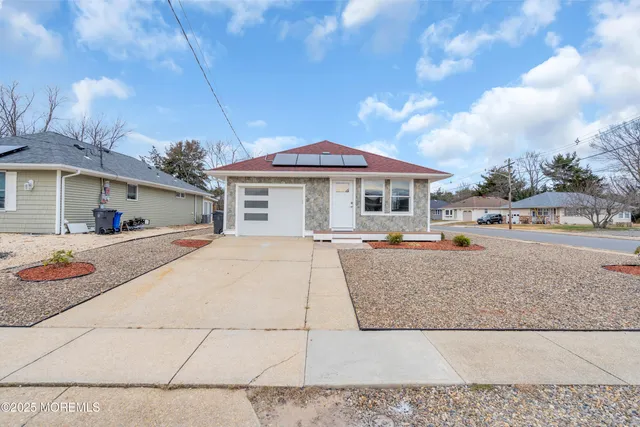 a front view of a house with entertaining space