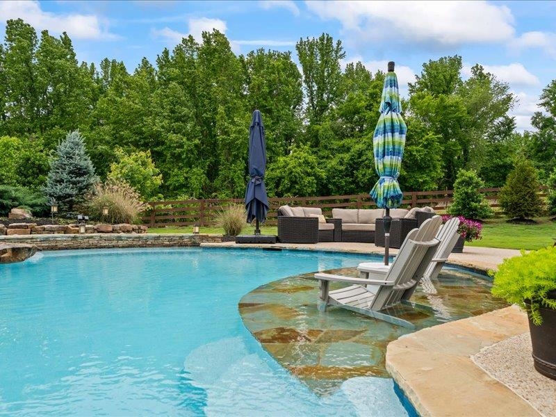 8104 Jack Bond Road Arlington, TN 38002 - Photo 30 of 40 a view of a swimming pool with lounge chair