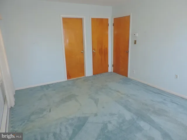 a view of a room with a door