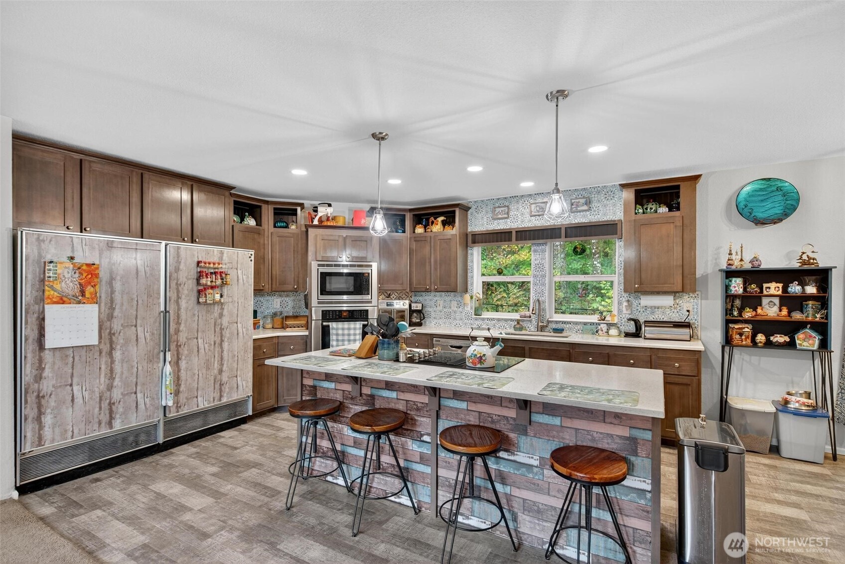 2 Crow Lane McCleary, WA 98557 - Photo 2 of 36 a kitchen with stainless steel appliances granite countertop a stove a refrigerator a oven with white cabinets and island