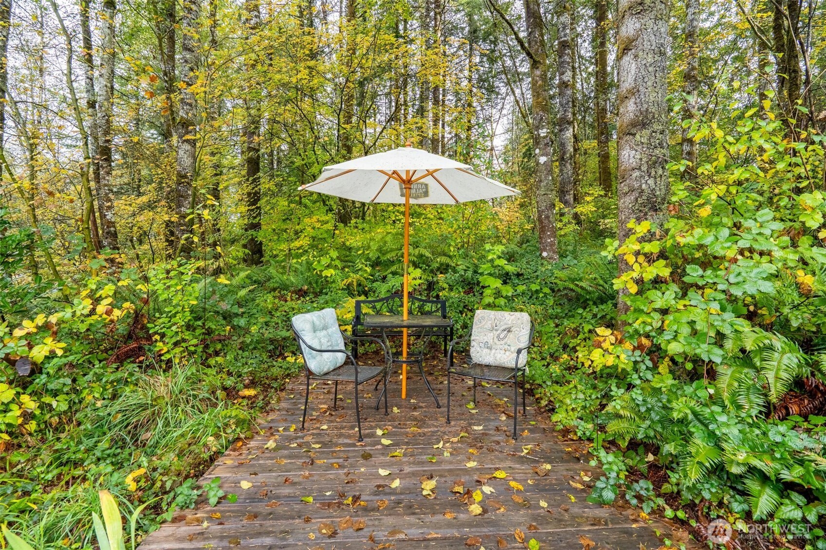 2 Crow Lane McCleary, WA 98557 - Photo 35 of 36 a view of a chairs and table under an umbrella