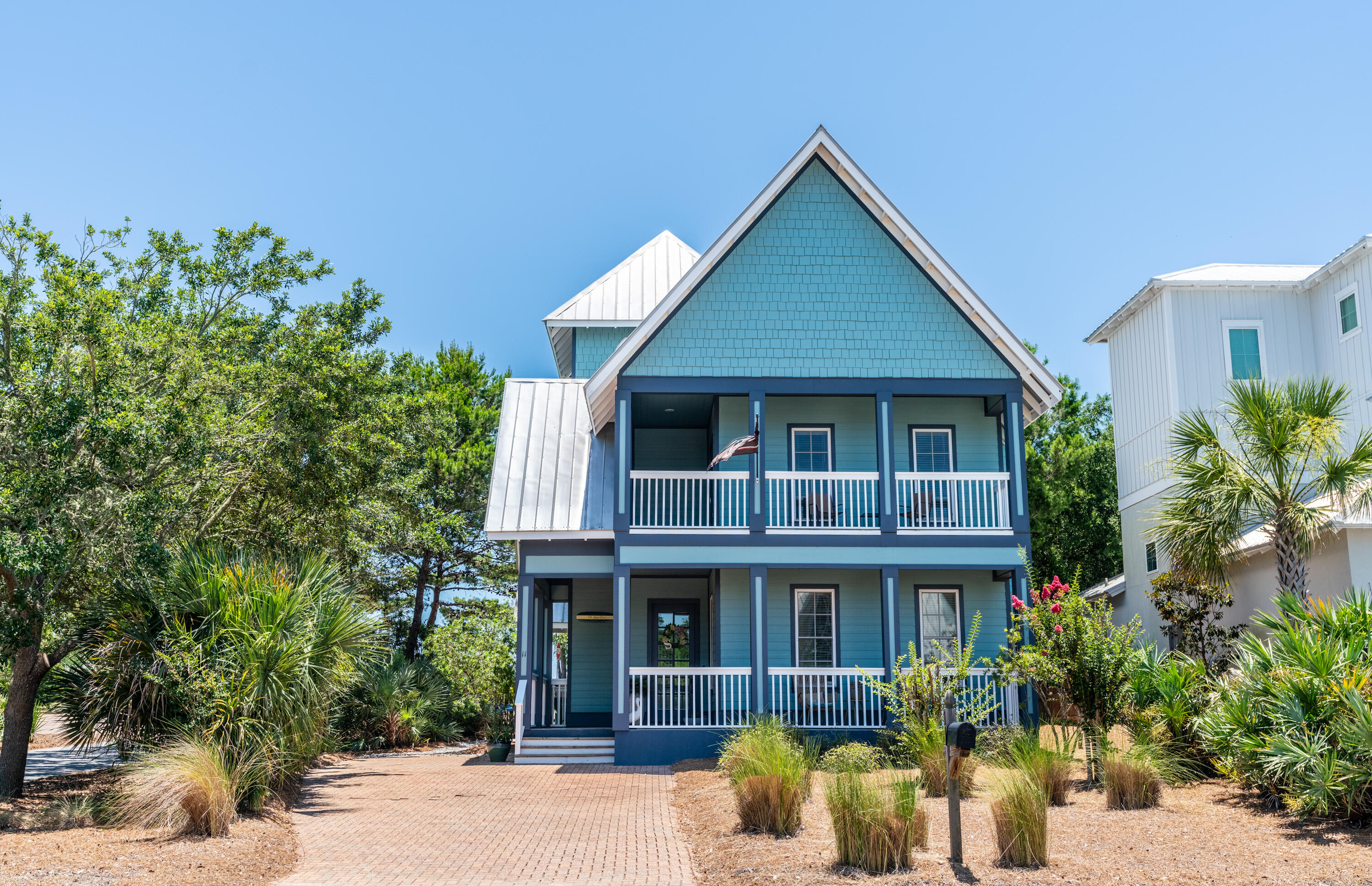 11 West Willow Mist Road Inlet Beach, FL 32461 - Photo 1 of 45 a front view of a house with garden