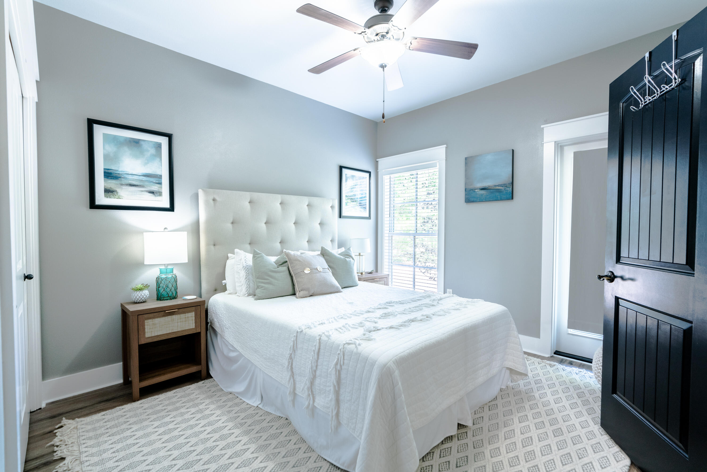 11 West Willow Mist Road Inlet Beach, FL 32461 - Photo 24 of 45 a bedroom with a bed and a chandelier