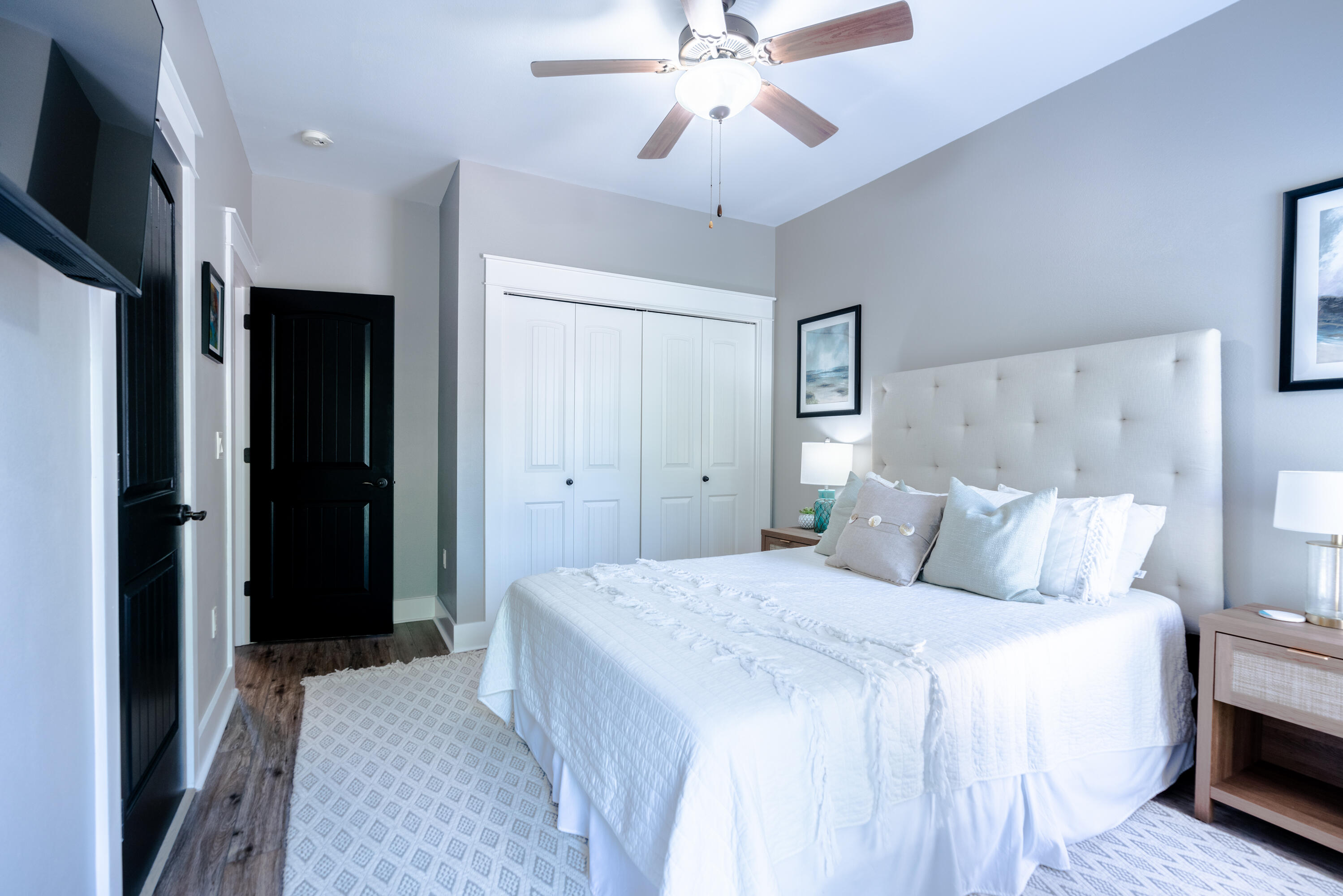 11 West Willow Mist Road Inlet Beach, FL 32461 - Photo 25 of 45 a bedroom with a bed and a chandelier