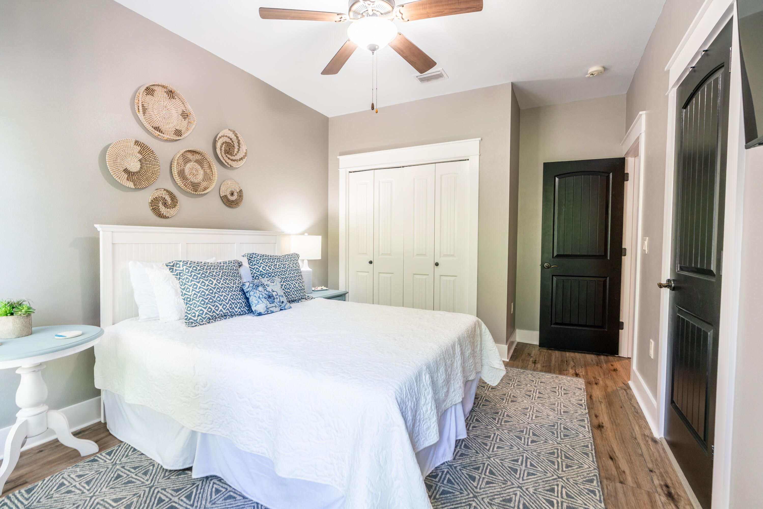 11 West Willow Mist Road Inlet Beach, FL 32461 - Photo 29 of 45 a bedroom with a bed and a chandelier
