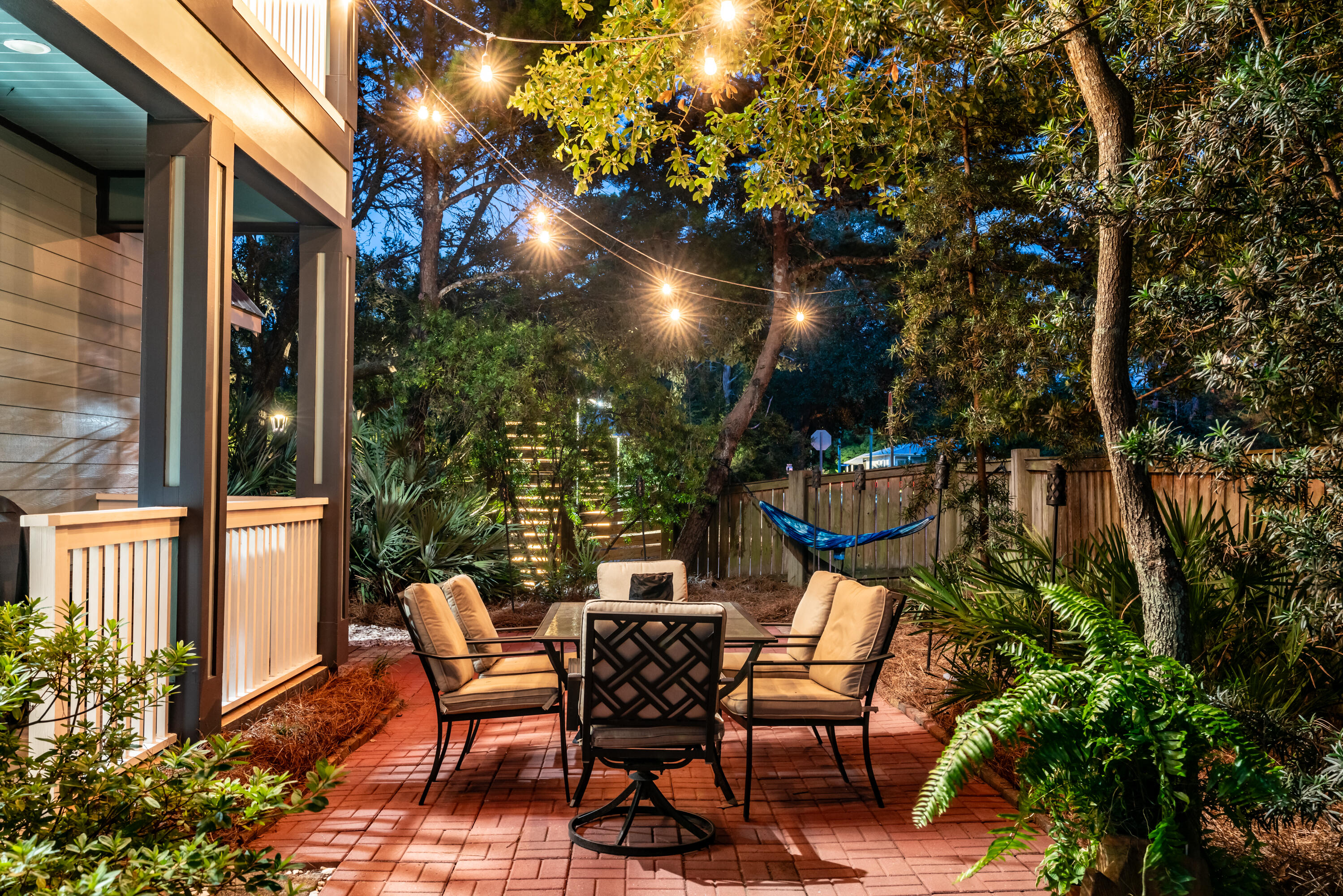 11 West Willow Mist Road Inlet Beach, FL 32461 - Photo 42 of 45 a view of a patio with table and chairs and potted plants