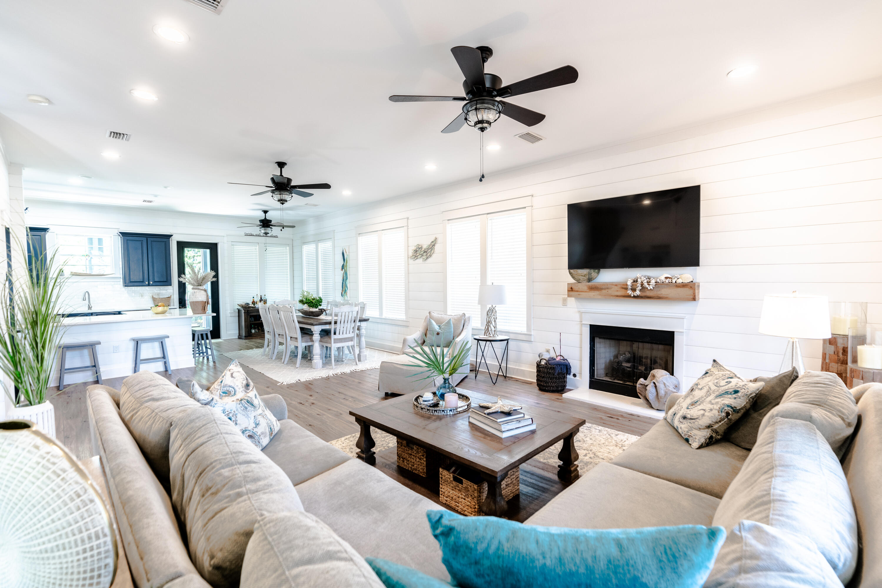 11 West Willow Mist Road Inlet Beach, FL 32461 - Photo 5 of 45 a living room with furniture a fireplace and a flat screen tv