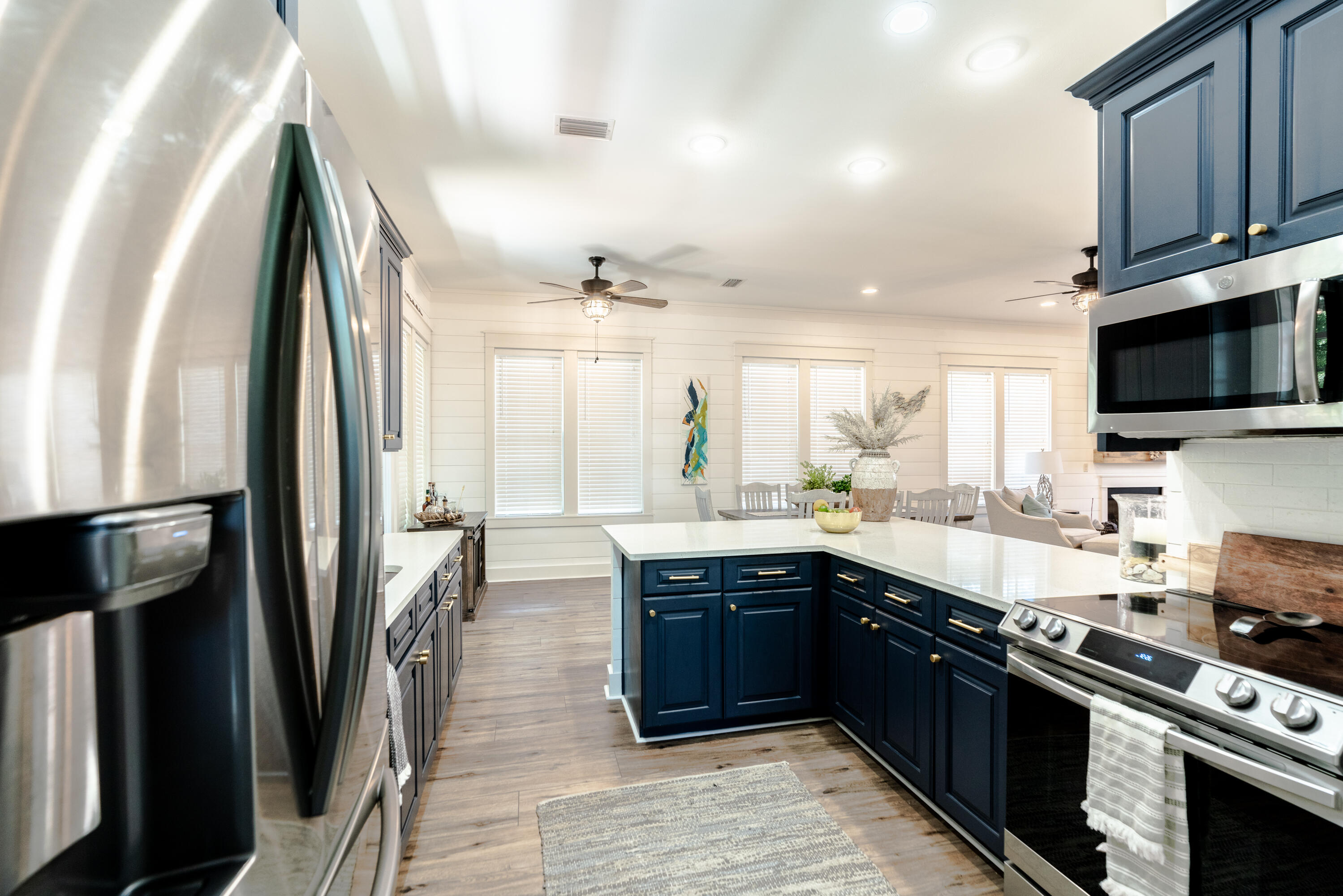 11 West Willow Mist Road Inlet Beach, FL 32461 - Photo 10 of 45 a large kitchen with stainless steel appliances granite countertop a stove refrigerator and a sink