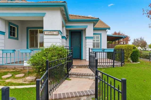 a house view with a garden space