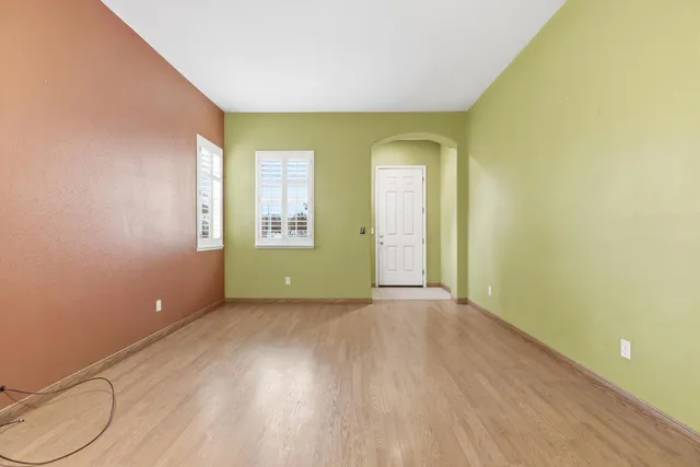 an empty room with windows