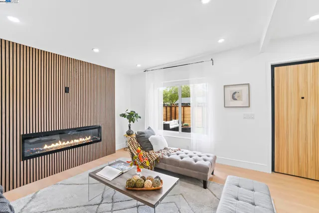 a spacious bedroom with a bed and a window