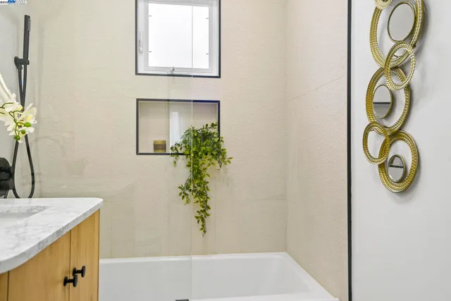 a patio with table and chairs