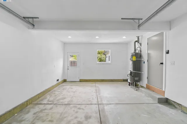 a view of an house with backyard space and balcony