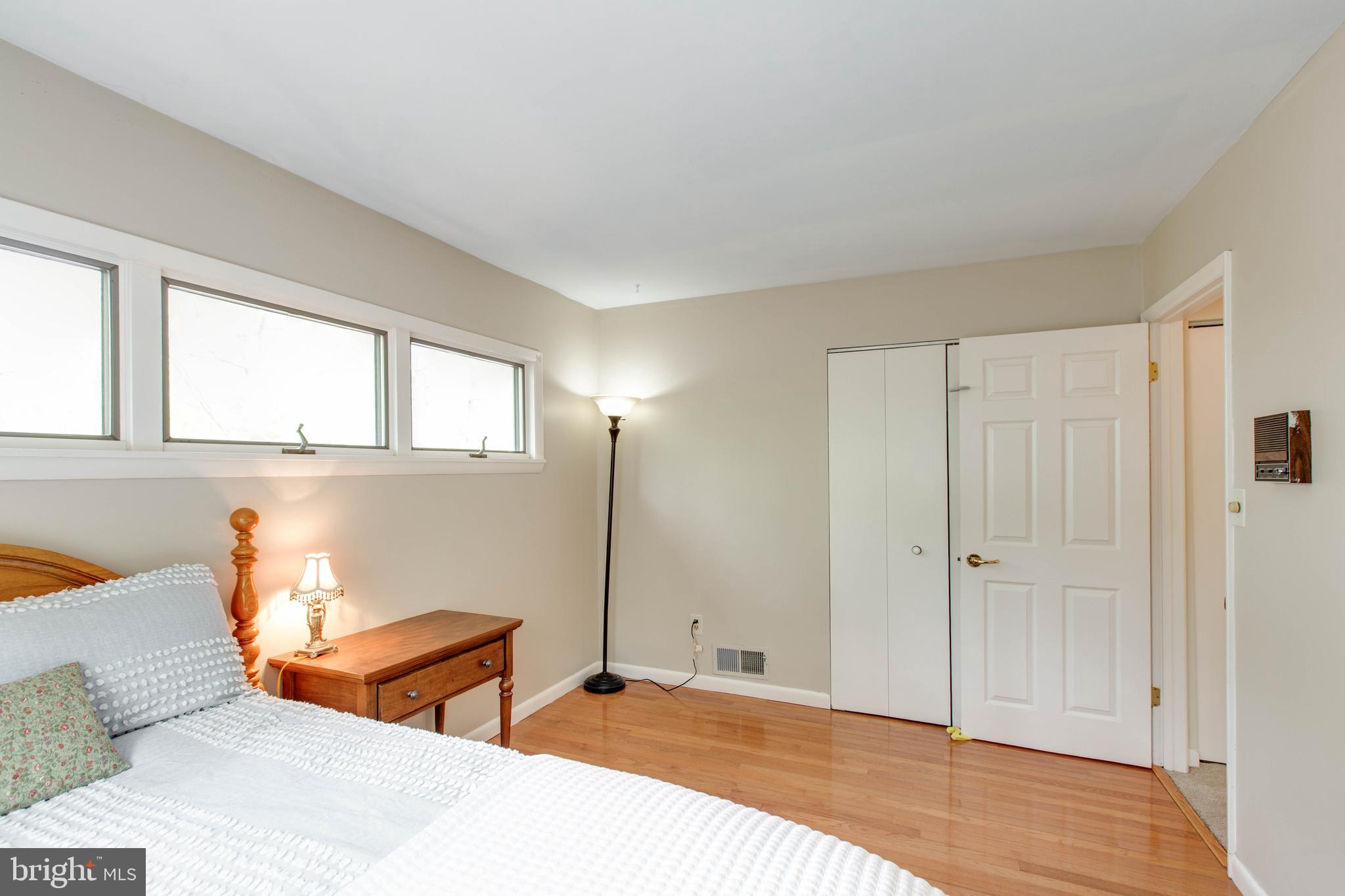 5519 Woodbine Road Sykesville, MD 21784 - Photo 38 of 69 a bedroom with a bed and a window