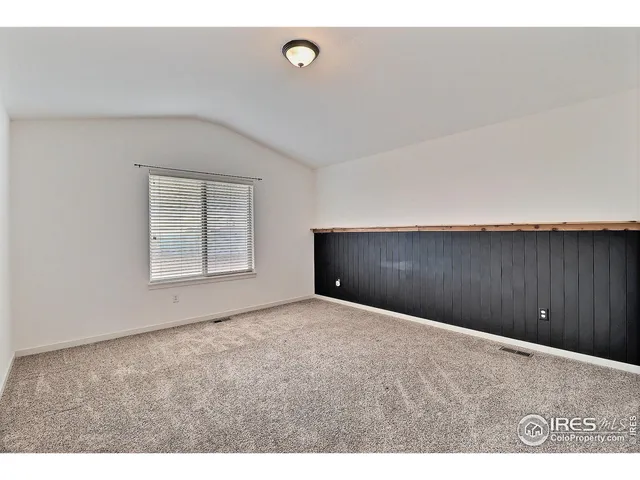 a bathroom with a sink a tub and a mirror