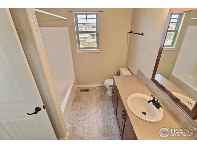 a view of a livingroom and a window