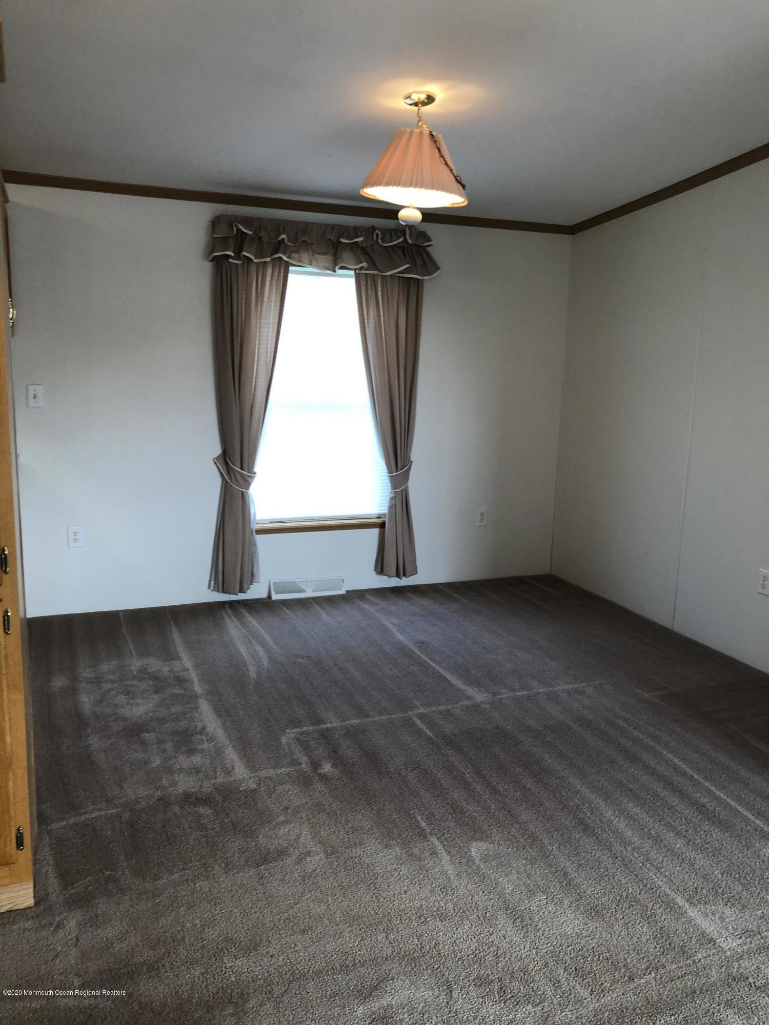 80 Robin Place, Unit 80 Freehold, NJ 07728 - Photo 5 of 16 A911D8CD-0868-4977-995E-7FC25DCD2E03