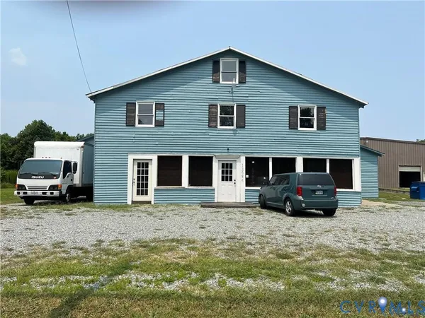 a view of a house with a swimming pool